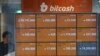 Bitcoin cae casi 20% tras superar récord en menos de una semana