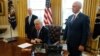 President Donald Trump, flanked by Health and Human Services Secretary Tom Price, left, and Vice President Mike Pence, meets with reporters regarding the health care overhaul bill at the White House in Washington, March 24, 2017.