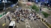 People attend a demonstration to demand the liberation of hostages who are being held in the Gaza Strip after they were seized by Hamas gunmen on Oct. 7, in Tel Aviv, Israel, Nov. 21, 2023.