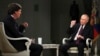 FILE - In this photo released by Sputnik news agency, Feb. 9, 2024, U.S. commentator Tucker Carlson interviews Russian President Vladimir Putin in Moscow on Feb. 6, 2024. Part of the interview was used to create a history quiz that Russian school children took this month.