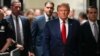 FILE — Former U.S. President Donald Trump arrives at a criminal court in New York, Feb. 15, 2024. On Wednesday, an Illinois judge barred Trump from Illinois' Republican presidential primary ballot because of his role in the Jan. 6, 2021, insurrection at the U.S. Capitol.