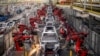 FILE - Robotic arms assemble cars in the production line for Leapmotor's electric vehicles at a factory in Jinhua, Zhejiang province, China, April 26, 2023. (China Daily via Reuters)