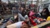 Wounded Palestinians are transported to Nasser Hospital, following Israeli strikes, amid the ongoing conflict between Israel and the Palestinian Islamist group Hamas, in Khan Younis, in the southern Gaza Strip, Dec. 5, 2023.