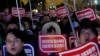 Doctors rally against the government's medical policy near the presidential office in Seoul, South Korea, Feb. 22, 2024. 
