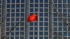 A Chinese flag flutters outside the Chinese foreign ministry in Beijing, China, Feb. 24, 2022.