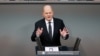 German Chancellor Olaf Scholz speaks at the 2024 budget debate of the German lower house of parliament, the Bundestag, in Berlin, Germany, Jan. 31, 2024. 