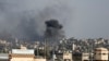 Smoke rises after an Israeli airstrike, amid the ongoing conflict between Israel and Palestinian Islamist group Hamas, in Khan Younis, southern Gaza Strip, December 9, 2023. 