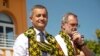 FILE - French Interior and Overseas Minister Gerald Darmanin (L) looks during a visit in Mamoudzou on the French Indian Ocean island of Mayotte, June 24, 2023. 