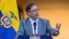 FILE - Colombian President Gustavo Petro speaks to supporters outside the presidential palace in Bogota, Colombia, Feb. 13, 2023.