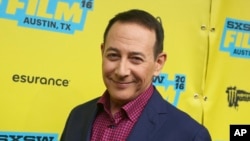 FILE - Paul Reubens attends the world premiere of "Pee-wee's Big Holiday" during the South by Southwest Film Festival, March 17, 2016, in Austin, Texas. Reubens died Sunday night after a six-year struggle with cancer.