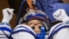 Roscosmos cosmonaut Oleg Kononenko reacts during a check of his space suits before launching to the International Space Station (ISS) at the Russia-leased Baikonur Cosmodrome in Kazakhstan, Sept. 15, 2023.