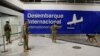 FILE - Soldiers patrol in the arrival area of Juscelino Kubitschek airport in Brasilia, Brazil, March 30, 2023. 