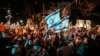 Demonstrators gather in Tel Aviv, Israel, to call for early elections and protest against Israeli Prime Minister Benjamin Netanyahu and his handling of the Israel-Hamas war, Feb. 17, 2024.
