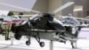 Mô hình một chiếc Z-10 của hãng Trung Quốc AVIC tại triển lãm hàng không Paris hồi tháng 6/2023. (REUTERS/Benoit Tessier)