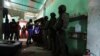 FILE - Police and soldiers conduct a joint operation searching for drugs and weapons in a neighborhood of Duran, Ecuador, Feb. 1, 2024. On Jan. 8, President Daniel Noboa declared a national state of emergency due to a wave in crime.
