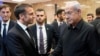 Israeli Prime Minister Benjamin Netanyahu shakes hands with French President Emmanuel Macron after their joint press conference in Jerusalem on October 24, 2023. 