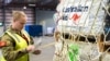 FILE - Humanitarian aid supplies are loaded on a airplane heading to Vanuatu, March 4, 2023, as part of the Australian Government's response to the Tropical Cyclones Judy and Kevin, at Amberley Base in Queensland. 