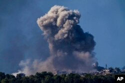 Smoke rises following an Israeli bombardment in the Gaza Strip, as seen from southern Israel, Jan. 4, 2024.