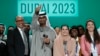 Dari kiri, Ketua Perubahan Iklim PBB Simon Stiell, Presiden COP28 Sultan al-Jaber dan kepala perundingan COP28 untuk UEA Hana Al-Hashimi berfoto di akhir KTT Perubahan Iklim PBB COP28 di Dubai, UEA, Rabu 13 Desember 2023.