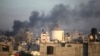 Smoke rises from the town of Khan Younis after Israeli strikes, Dec. 15, 2023. 