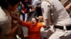 Police detain supporters of the Aam Aadmi Party during a protest after the party's main leader and Delhi Chief Minister Arvind Kejriwal was arrested by the Enforcement Directorate, India's financial crime agency, in New Delhi, March 26, 2024.