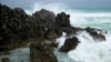 Waves crash against the South Shore as winds from Hurricane Ernesto approach Church Bay, Bermuda, Aug. 16, 2024. 