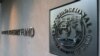 Logo Dana Moneter Internasional dipasang di gedung kantor pusat di Washington, 4 September 2018. (Foto: Reuters)