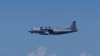 This photo provided by Japan's Ministry of Defense shows a Chinese Y-9 reconnaissance plane on Aug. 26, 2024. According to the ministry, the plane violated Japanese airspace above Danjo Islands in the South China Sea for two minutes while circling around the area.