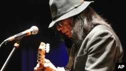 FILE - Singer-songwriter Sixto Rodriguez performs at the Beacon Theatre on April 7, 2013, in New York.