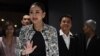 Puea Thai party leader Paetongtarn Shinawatra, known by her nickname Ung Ing and the youngest daughter of former prime minister Thaksin Shinawatra, waves as she leaves a press conference in Bangkok on Aug. 15, 2024. 