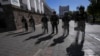 Military police guard the presidential palace in Quito, Ecuador, Aug. 10, 2023. President Guillermo Lasso declared a state of emergency after the assassination of presidential candidate Fernando Villavicencio at a campaign rally in Quito. 