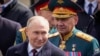 Presidenti rus Vladimir Putin dhe ish ministri i mbrojtjes, Sergei Shoigu