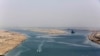 FILE - The entrance of the new section of the Suez Canal in Ismailia, Egypt, on Aug. 6, 2015. 