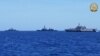 This handout photo from the Armed Forces of the Philippines (AFP) released Apr. 7, 2024 shows ships participating in the first Multilateral Maritime Cooperative Activity between the Philippines, US, Australia and Japan, in South China Sea. 