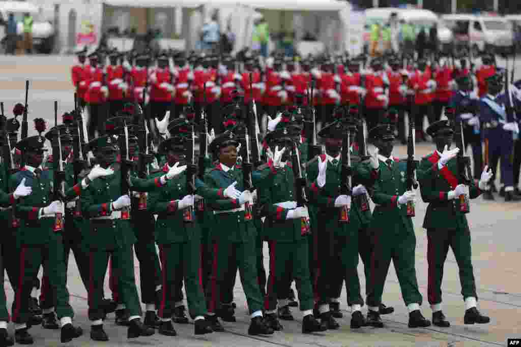 Nigeria's military marches at the inauguration of Nigerian President Bola Tinubu at the Eagle Square in Abuja, Nigeria, May 29, 2023.