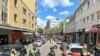 Police cordon off an area near the Reeperbahn in Hamburg, Germany, June 16, 2024. Police say officers have shot and wounded a man who was threatening them with an axe and a firebomb.