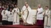 Pope Francis presides over Christmas Eve Mass, at St. Peter's Basilica at the Vatican, Dec. 24, 2023.