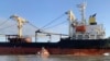 In this photo provided by Ukraine's Border Guard Service, a Panama-flagged civilian cargo vessel is seen in Odesa region, Dec. 28, 2023. The vessel hit a Russian mine resulting in two injured sailors, said Ukraine's Southern Defense Forces.