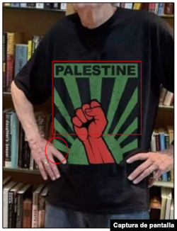 Detalle en la mano del escritor en la imagen viral, así como el logo de la camiseta.