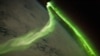 FILE - This NASA image released June 21, 2010, shows the Aurora Australis on May 29, 2010. The image was taken during a geomagnetic storm; the U.S. Space Weather Prediction Center has issued a warning for a strong geomagnetic storm on Saturday.