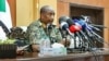 FILE - This handout image posted on the Sudanese Armed Forces's facebook page on Aug. 24, 2024, shows army chief General Abdel Fattah al-Burhan giving a press conference in Port Sudan, in Red Sea state.