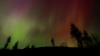 FILE - The Northern Lights are seen May 10, 2024, in Estacada, Ore. The National Oceanic and Atmospheric Administration said Aug. 12 that Earth had been hit by a solar storm that could bring the Northern Lights to night skies farther south than normal.