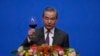 Chinese Foreign Minister Wang Yi gives a toast to invited guests after delivering a speech at a reception for Commemoration of the 45th Anniversary of China-U.S. Diplomatic Relations at the Diaoyutai Guest House in Beijing, Jan. 5, 2024. 