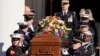 An Armed Forces body bearer team carries the casket of former first lady Rosalynn Carter after a tribute service at Glenn Memorial Church at Emory University, in Atlanta, Nov. 28, 2023.