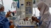 Palestinian medics care for premature babies evacuated from Al Shifa hospital to the Emirates hospital in Rafah in the southern Gaza Strip, Nov. 19, 2023.