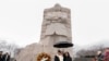 Martin Luther King III accompanied by his daughter Yolanda Renee King and his wife Andrea Waters King, pose during the Annual Martin Luther King Jr. Wreath Laying Ceremony at Martin Luther King Jr. Memorial in Washington, Jan. 15, 2024. 