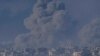 Smoke rises following an Israeli bombardment in the Gaza Strip, as seen from southern Israel , Dec. 6, 2023.
