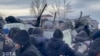 In this photo taken from video released by Russian independent news outlet SOTA telegram channel on Jan. 17, 2024, Russian police clash with protesters in Baymak, Bashkortostan, a region spread between the Volga River and the Ural Mountains, Russia.
