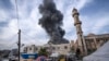 FILE - Smoke rises following an Israeli bombardment on Rafah, southern Gaza Strip, Dec. 20, 2023.