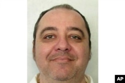 FILE - This undated photo provided by the Alabama Department of Corrections shows Kenneth Eugene Smith, who was convicted in a 1988 murder-for-hire slaying. Alabama's first attempt to execute Smith by lethal injection was aborted when authorities couldn't connect the IV line.